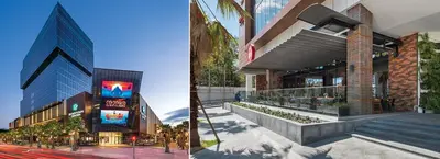 two different views of a building with a street at Cozy apartment in exclusive area Bella Vista in Santo Domingo