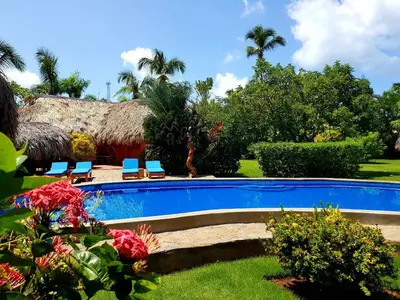 a resort with a swimming pool in the yard at Solazul in Las Galeras