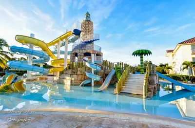 a water park in a resort with a water slide at Pez 106 in Bayahibe