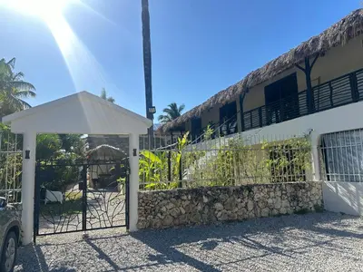 a gate in front of a building at El Rincon de Abi in Las Terrenas