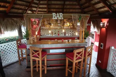 a bar on the deck of a restaurant at Casa Azul Las Galeras in Las Galeras