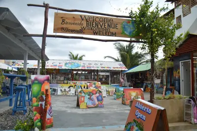 a store with a sign in front of a playground at Caribe Apartament S&D el castillo dominicus Apartamento #9 in Bayahibe