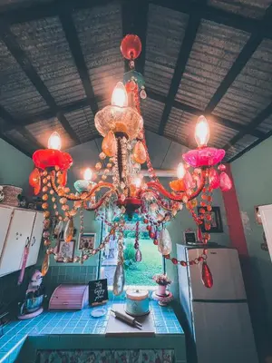 a chandelier hanging from the ceiling in a kitchen at Campito Loving in Higuey