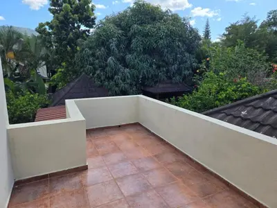 a balcony with a white railing on a house at Ximenoa Rivers Villa Relax in Jarabacoa