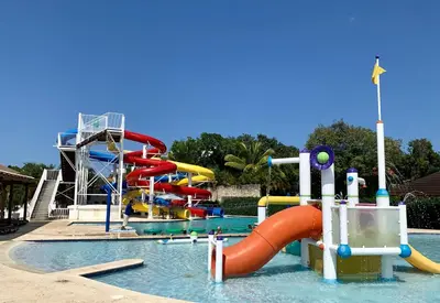 a water park with a water slide in it at Casa Coral Sosua in Sosúa