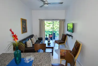 a living room with a couch and a table at Rosil Place in San Felipe de Puerto Plata