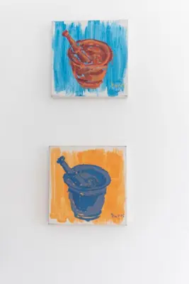two paintings of two blue bowls on a wall at Villa Cuatro Peces in Las Galeras