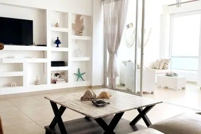a living room with a coffee table and a couch at Beach Apartment - Marbella, Juan Dolio!! Getaway Offer!! in Juan Dolio