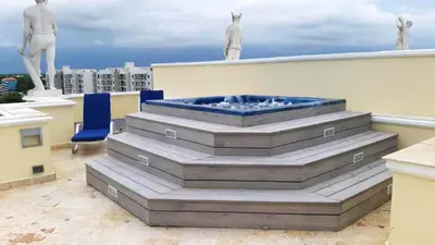 a hot tub on the roof of a building at Elegant apartment with Jacuzzi in Boca Chica - 200 m² in Boca Chica