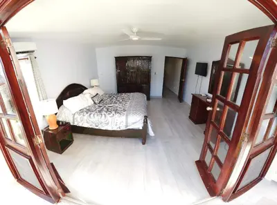 an aerial view of a bedroom with a bed at Nanny Estates Cabarete kiters Condo C-6 in Cabarete