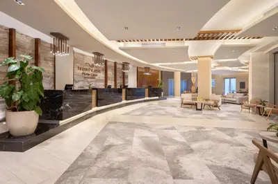a lobby of a hotel with a reception at Breathless Punta Cana Resort & Spa - Adults Only - All Inclusive in Punta Cana