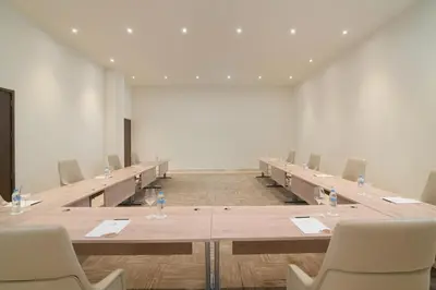 a large conference room with a long table and chairs at Dreams Macao Beach Punta Cana - All Inclusive in Punta Cana