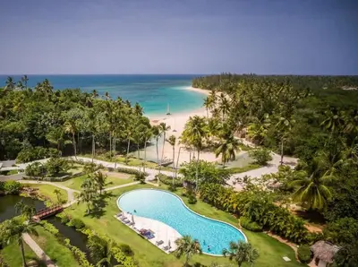 an aerial view of a resort with a swimming pool and a beach at Penthouse Las Playas in Las Terrenas