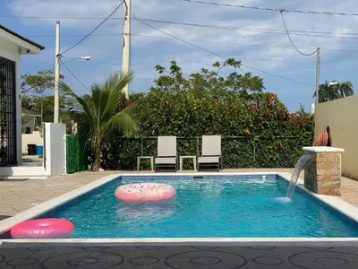 a small swimming pool with a toy in the water at 2bedroom mountain view villa #2 in Muñoz