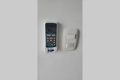 a remote control sticking out of a door at Hanly Roger's Brand new place in San Felipe de Puerto Plata
