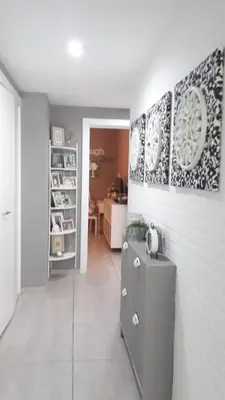 a kitchen with white walls and a refrigerator at Apartamento Estrella Dominicus in La Laguna
