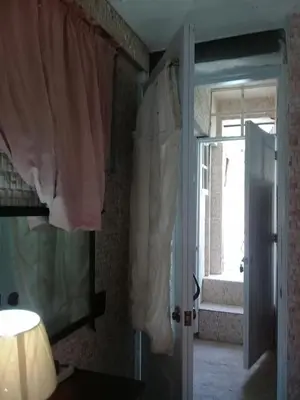 a room with a door open to a room with a window at Villa Julirous Rd, spa and aparthotel camp for vacationers in Boca Chica