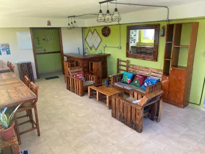 a living room with couches and tables and a mirror at Private Study Punta Cana in Punta Cana