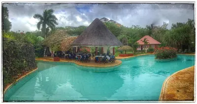 a painting of a swimming pool at a resort at Las Puertas del Paraíso in Río San Juan