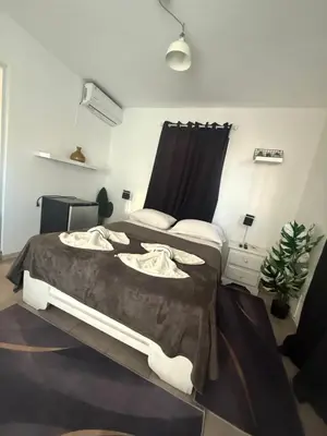 a bedroom with two beds in a room at Hotel Sol Azul in La Romana