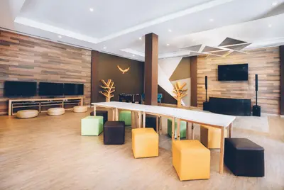 a conference room with a table and chairs at Iberostar Selection Bavaro Suites - All Inclusive in Punta Cana