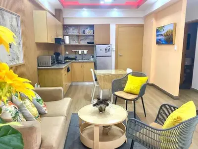 a living room with a couch and chairs and a table at Estancia Casa Real Frente a la Zona Colonial in Calero