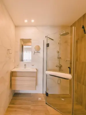 a bathroom with a sink and a shower at Fully Serviced Apartment at Regatta Living II - 905 in Santo Domingo