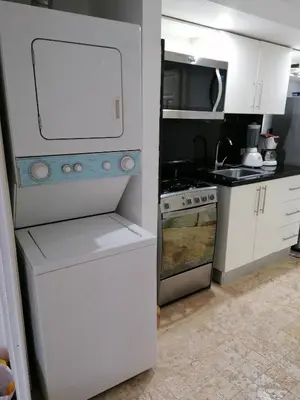 a kitchen with a white refrigerator and a stove at Apartment Monocal in Boca Chica in Boca Chica