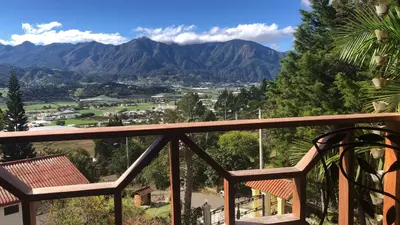 a view of the mountains from the balcony of a house at Villa Paloma/ Home/ Office-Remote Office in Constanza