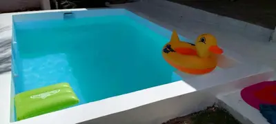 a toy rubber duck sitting in a toy pool at Apto Los Blancos, a dos Minuto de los Patos in Bejuquero