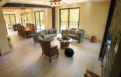a living room with couches and a table at Villa segur-a vicente in Concepción de La Vega