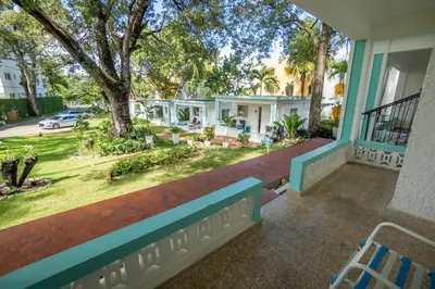 a view from the porch of a house at Bungalow #14 at Waterfront Playa Alicia in Sosúa