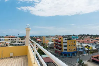 a view of a city from a balcony at 2 Bedroom-Apartment - Corales del Sur Ole Las Americas- Isabelita - Aeropuerto in La Viva