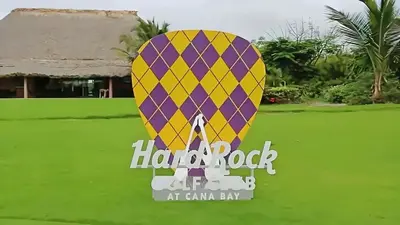 a sign for a hot air balloon at canaan bay at Cana Rock Star Pool View Whith BBQ in Punta Cana