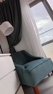a chair sitting in front of a window at Mar Mary Ocean View in Boca Chica