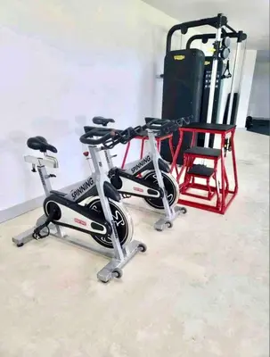 a couple of bikes parked next to a chair at Cana Rock Chic Golf de Lux in Punta Cana