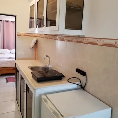 a kitchen with a sink and a counter top at Lovely location , right downtown Puerto Plata in San Felipe de Puerto Plata
