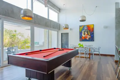a billiard room with a pool table at Villas Agua Dulce in Sosúa