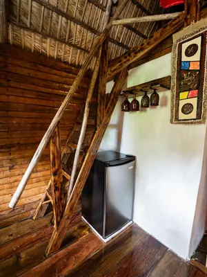 a television in a room with wooden walls at Valle Bucana in Santa Bárbara de Samaná