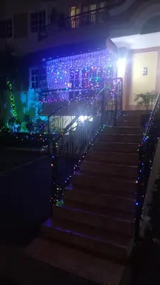 a set of stairs with christmas lights at night at SANTIAGO PARADISE 111 S 3 in Santiago de los Caballeros