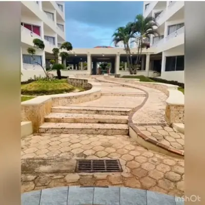 a set of stairs in front of a building at Apartamento estudio frente al mar in Guayacanes