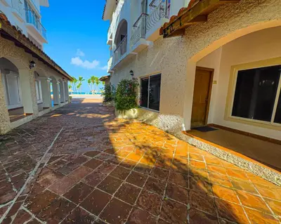 an empty street in front of a building at Paradise Suite Cadaqués in Bayahibe