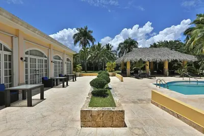 a resort with a swimming pool and a building at Four Points by Sheraton Santo Domingo in Santo Domingo