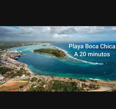 an island in the ocean with the words playa boca chica at 3bed Apartment con Terraza y Picsina privada in Santo Domingo