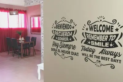 a wall with a heart that says welcome remember to smile happyenna todayayagency at Acogedor-Hermoso apart completo equipado de 2 hab. in Santiago de los Caballeros