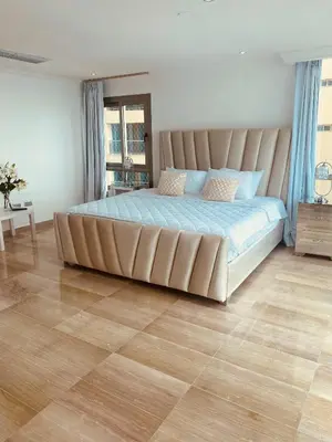 a large bed with a large headboard in a bedroom at Malecón vista mar Habitación Privada Larimar, in Santo Domingo
