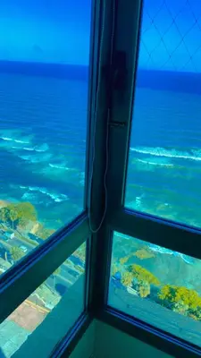 a view of the ocean from a window at Malecón vista mar Habitación Privada Larimar, in Santo Domingo