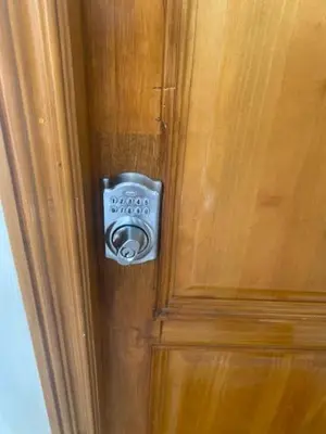 a door with a knob on a wooden door at Cadaques Caribe Bayahibe in Bayahibe