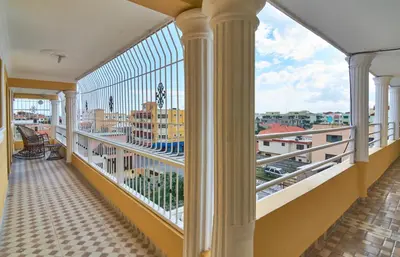 a balcony with a view of the city at Cozy One Bedroom Apartment in Santo Domingo Este in La Viva