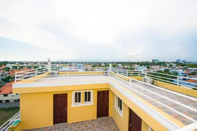 a view from the roof of a building with yellow at Modern Studio Near Airport Fast WiFi Generator in La Viva